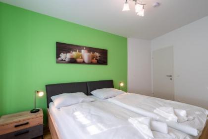 Vienna City and SPA - Modern Apartments next to Therme Wien & 15 Minutes to the City Center - image 13