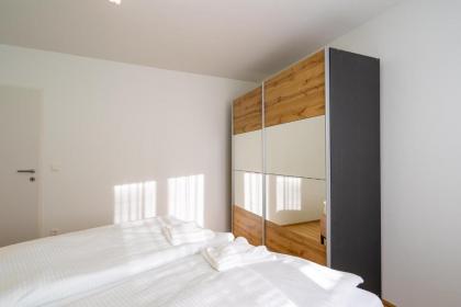 Vienna City and SPA - Modern Apartments next to Therme Wien & 15 Minutes to the City Center - image 14