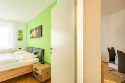 Vienna City and SPA - Modern Apartments next to Therme Wien & 15 Minutes to the City Center - image 19