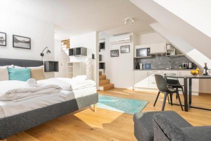 Rooftop Apartments mit großer Terrasse - image 21